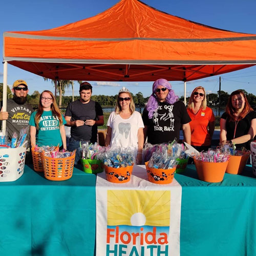 DOH Columbia Miles of Smiles Dental Program Hands Out Toothbrushes at Trunk or Treat in Lake City