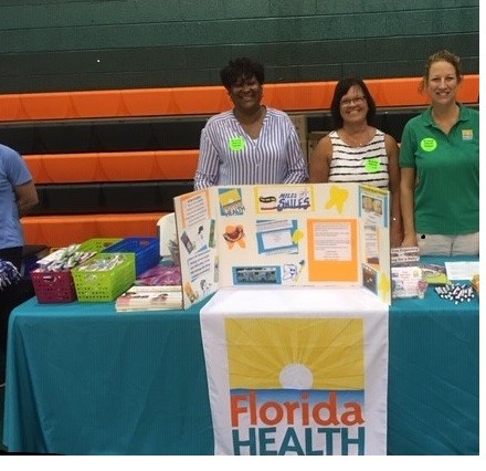 DOH Columbia/Hamilton Staff Attend Backpack Giveaways
