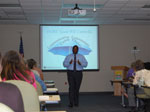 Dr. Andrew Daire, Director of the UCF Marriage and
                            Family Research Institute, delivers a workshop as part of the EI